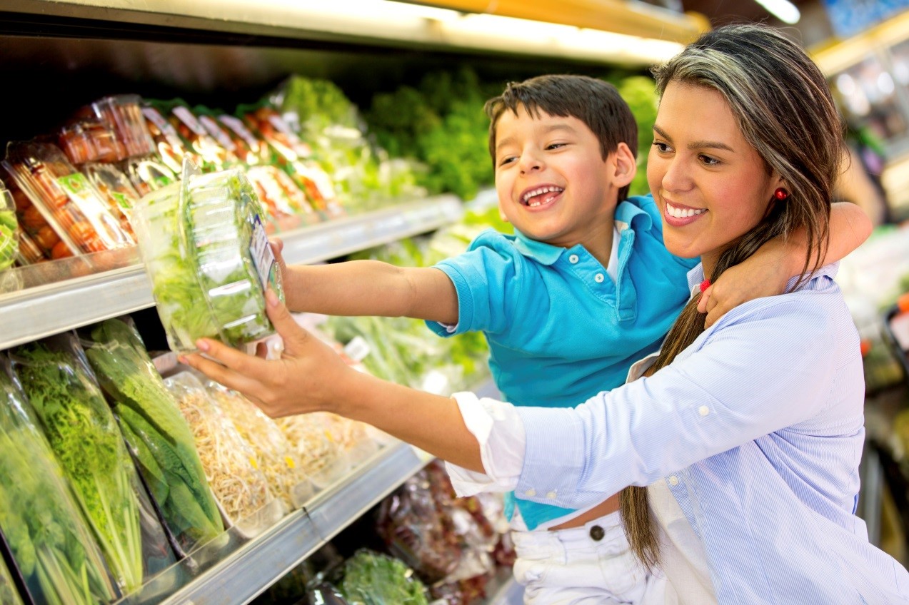 Mum and child shopping in the supermarket