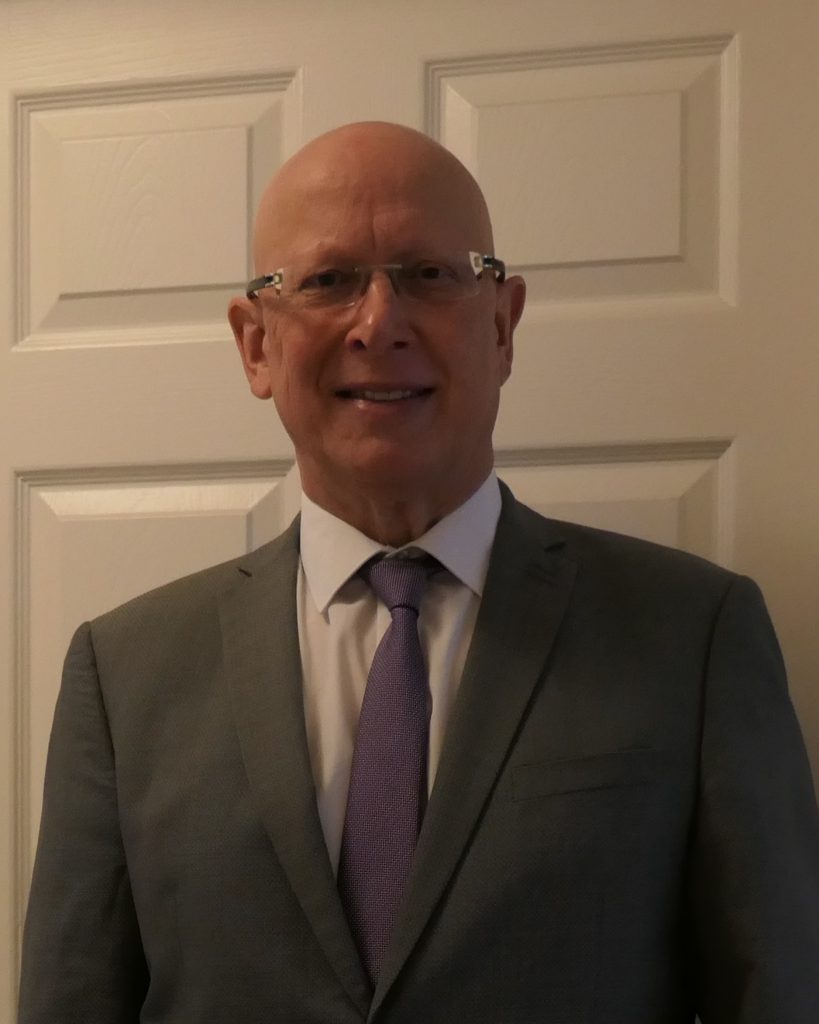 A photograph of Trustee, Edward May.