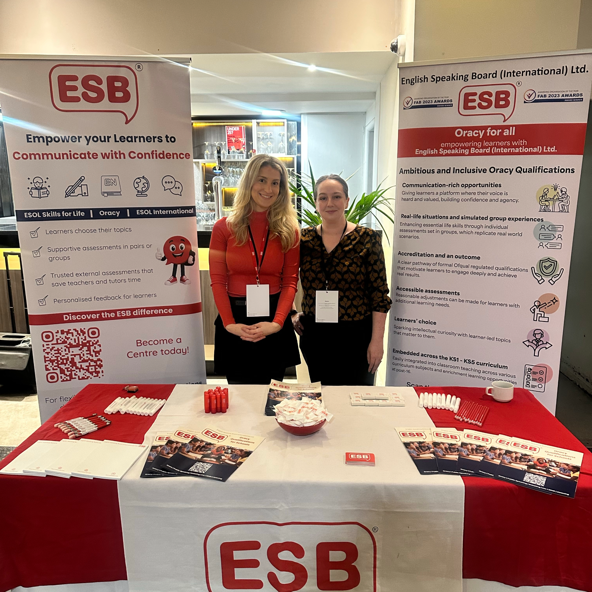 Senior Customer Experience Officer, Georgie Anderson (left) and Senior Assessor for Oracy, Lauren Kearney (right) at The Great Oracy Exhibition 2026.